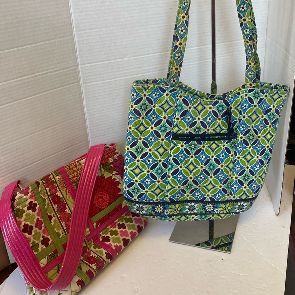Two-piece Vera Bradley shoulder bags. One pink floral, and one green flo…
